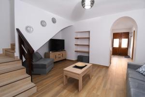 a living room with a couch and a table at Casa Rural Alborelax in Alborea