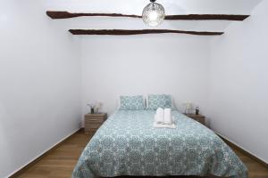 Postel nebo postele na pokoji v ubytování Casa Rural Alborelax