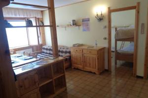 A bed or beds in a room at Intero appartamento in stile montagna