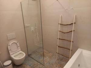 Kúpeľňa v ubytovaní Notus Suites