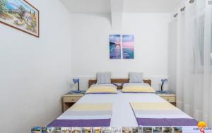 Postel nebo postele na pokoji v ubytování House Lucija