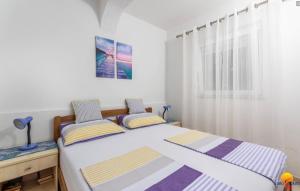 Postel nebo postele na pokoji v ubytování House Lucija