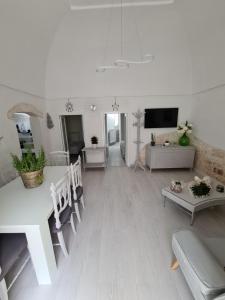 TV a/nebo společenská místnost v ubytování Bed & Breakfast Dimora Felice