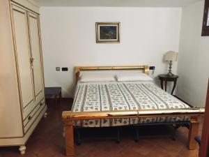 Postel nebo postele na pokoji v ubytování b&b le magnolie