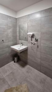 Koupelna v ubytování Novohradská