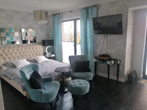 Χώρος καθιστικού στο Apartamenty De Soleil