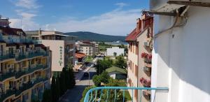 an aerial view of a city street with buildings at Hotel Laguna - Guest House in Primorsko