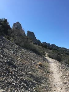 a trail on the side of a rocky mountain at Chambres & Table d'Hôtes Au Soleil du Bonheur in Lafare