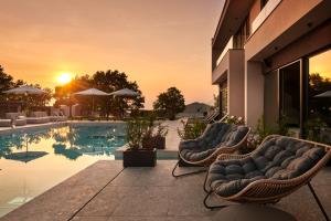Bazén v ubytování San Servolo Wellness Homes nebo v jeho okolí