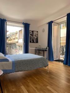 Postel nebo postele na pokoji v ubytování B&B DORMIRE DAI GRIMALDI