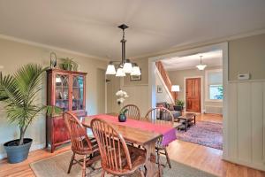 a dining room with a table and chairs at Charming Abode with Patio - Walk to Town and River! in Stockton