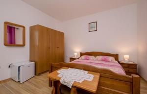 Posteľ alebo postele v izbe v ubytovaní Rooms Marijana
