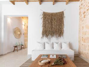 A seating area at S'Enclova Petit Hotel