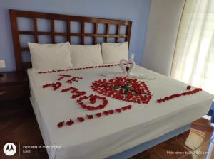 Postel nebo postele na pokoji v ubytování Hotel D Abril
