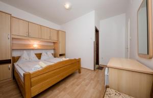 Posteľ alebo postele v izbe v ubytovaní Rooms Marijana