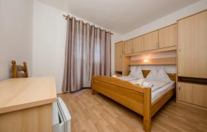 Posteľ alebo postele v izbe v ubytovaní Rooms Marijana