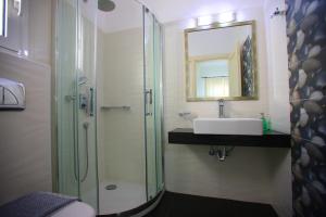 Kylpyhuone majoituspaikassa Mando Beachfront