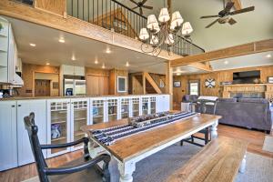 a large living room with a table and a kitchen at The Front Porch 20-Acre Country Home with Mtn View in Red Lodge