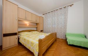Posteľ alebo postele v izbe v ubytovaní Rooms Marijana