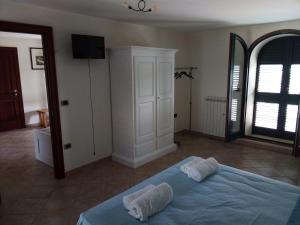 Postel nebo postele na pokoji v ubytování Attico Matine