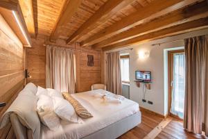 Ein Bett oder Betten in einem Zimmer der Unterkunft Au Berceau du Bien-Etre