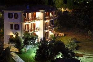 an aerial view of a building at night at Mando Beachfront in Stafylos