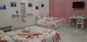 A bed or beds in a room at L'Opera dei Pupi B&b