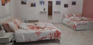 A bed or beds in a room at L'Opera dei Pupi B&b