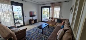 Svetainės erdvė apgyvendinimo įstaigoje Appartement neuf haut standing vue mer