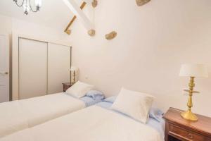 Katil atau katil-katil dalam bilik di Casa de al Lado en Barcenaciones