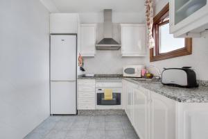 Kuchnia lub aneks kuchenny w obiekcie Villa 1B