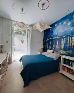 Säng eller sängar i ett rum på #casacongiardino