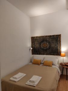Ein Bett oder Betten in einem Zimmer der Unterkunft Bhappy@home Lisboa