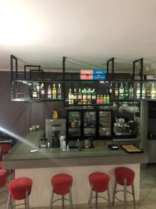 The lounge or bar area at Amalia Hotel