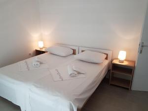 Postel nebo postele na pokoji v ubytování Bed & Breakfast Dora