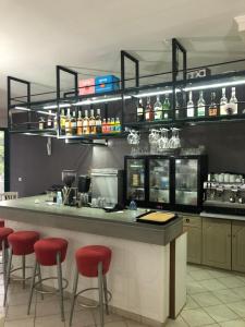 The lounge or bar area at Amalia Hotel