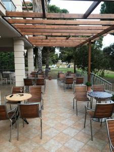 A restaurant or other place to eat at Amalia Hotel