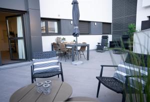 A seating area at Central Premium Pool Terrace new