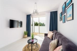 TV a/nebo společenská místnost v ubytování Apartamenty Bellamaya - Kapitanska 18