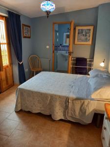 Giường trong phòng chung tại Casa Moya