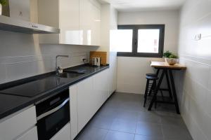 A kitchen or kitchenette at Central Premium Pool Terrace new