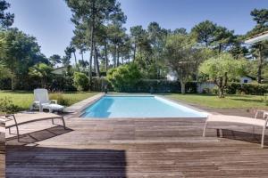 Hồ bơi trong/gần Villa Alaska - climatisée 10 personnes avec piscine chauffée