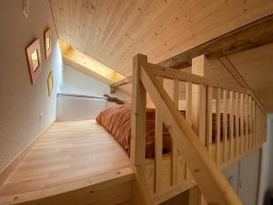 Postel nebo postele na pokoji v ubytování Sunnu-Loft