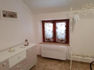 Et badeværelse på La Tana dei Sognatori - appartamenti con giardino