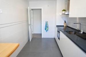 A kitchen or kitchenette at Central Premium Pool Terrace new