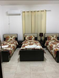 Postel nebo postele na pokoji v ubytování Joseph apartment