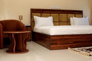 Cama o camas de una habitación en Guest Pride Hotel