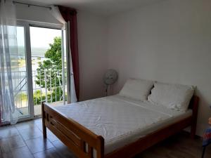 Postel nebo postele na pokoji v ubytování Apartment Karlo