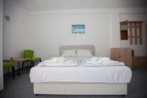 Voodi või voodid majutusasutuse Vinarija "Đelmo" apartments toas