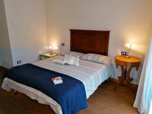 Un pat sau paturi într-o cameră la La Chouette